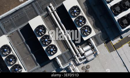 Large scale commercial data center with HVAC, cooling, ventilation, colocation, big data processing, and machine learning infrastructure. Stock Photo