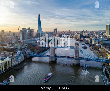 Aerial view of a modern skyscraper rising above the urban skyline at ...