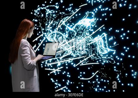 AI expert optimizes deep learning model with laptop, adjusting artificial neurons connectivity. Engineer looking at neural network architecture visual map, enhance processing speed of massive datasets Stock Photo