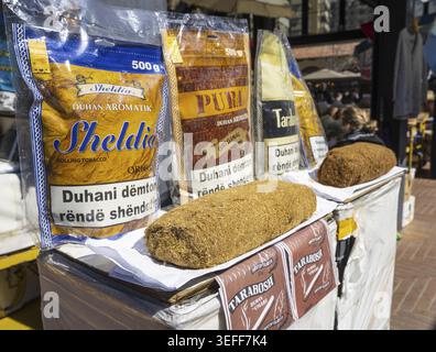 Tirana, Albania. March 2023. selling pouches of tobacco at a stall in an  open-air market in the city centre Stock Photo