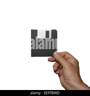 Old floppy disk for data storage on hand on a transparent background Stock Photo