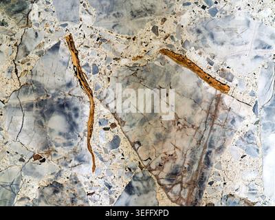 Golden Veined  Marble Abstract Close-Up Stock Photo