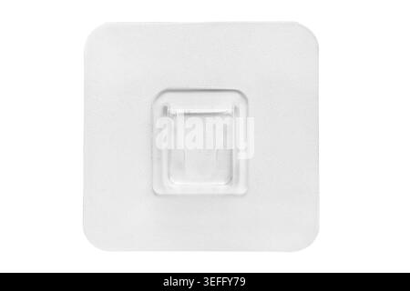 Transparent adhesive wall sticker hanger isolated on white background Stock Photo