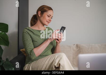 Online shopping, mobile ecommerce, woman using smartphone Stock Photo