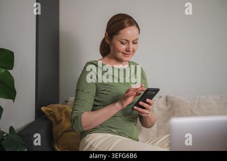 Online shopping, mobile ecommerce, woman using smartphone Stock Photo