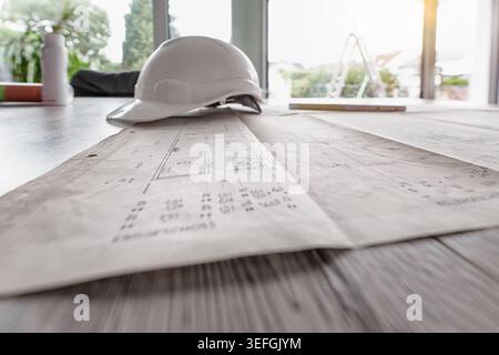 Architect rolls and architectural plan,technical project drawing Stock Photo