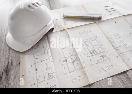 Architect rolls and architectural plan,technical project drawing Stock Photo