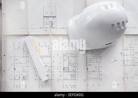 Architect rolls and architectural plan,technical project drawing Stock Photo
