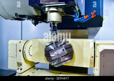 5 Axis CNC milling machine precision manufacturing process, metalworking industry. Stock Photo