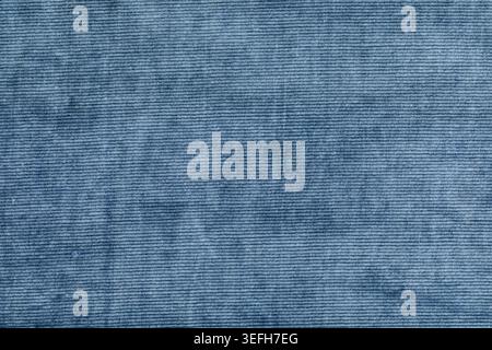 Blue corduroy fabric surface with fine ribbed texture Stock Photo