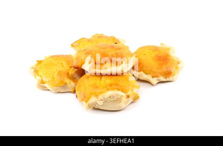 Homemade Pardulas, also called Formaggelle, on white background. It is a typical Sardinian small cake made with ricotta or cheese. Stock Photo