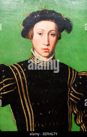 Renaissance portrait of blond lad with a serious face Stock Photo