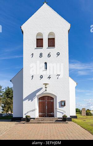 Historic building entrance featuring white double doors, fluted columns ...