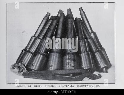 Industrial drill chucks are displayed, representing early 20th century manufacturing history, showing tools used in mechanical engineering, factory production, and skilled trades. ORGANIZATION AND ECONOMY IN THE RAILWAY MACHINE SHOP. By H. W. Jacobs. Part IV. STANDARDIZATION OF THE SMALL-TOOL EQUIPMENT. From The Engineering Magazine Devoted to Industrial Progress Volume XXXII October 1906 - March 1907 The Engineering Magazine Co Stock Photo