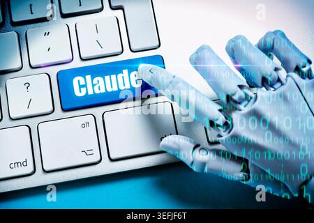 A robotic finger pressing a computer key labeled Claude, photomontage Stock Photo