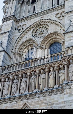 Facade sculptures, Gallery of Kings and rose window details on Notre Dame Cathedral in Paris in Paris, France on August 9, 2017. Stock Photo