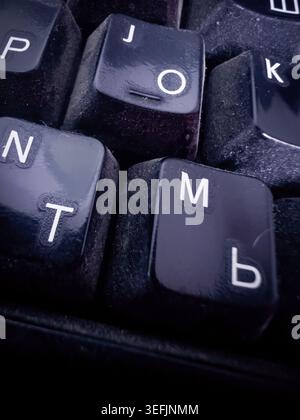 Close-up of dirty keys on a computer keyboard. Stock Photo