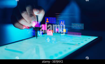 Designer hand using stylus on tablet with UI UX interface icons and AI code. Professional developer working on application design. Digital technology Stock Photo
