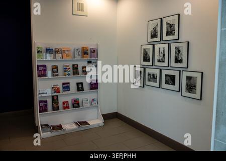 Gallery Wall Display of Black‑and‑White Urban Photographs Stock Photo