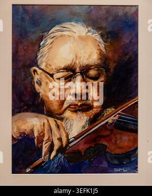 A framed mixed‑media artwork depicts a stylized human figure emerging from swirling, colorful lines over a natural wood background, blending texture Stock Photo