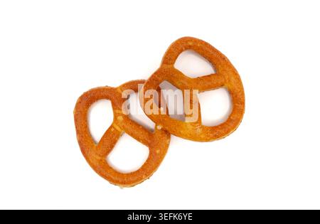 Crispy golden-brown pretzel twist, freshly baked and isolated on white. Ideal for food advertising, bakery menus, snack packaging, and Oktoberfest pro Stock Photo