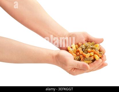 tri color pasta in hand path isolated on white Stock Photo