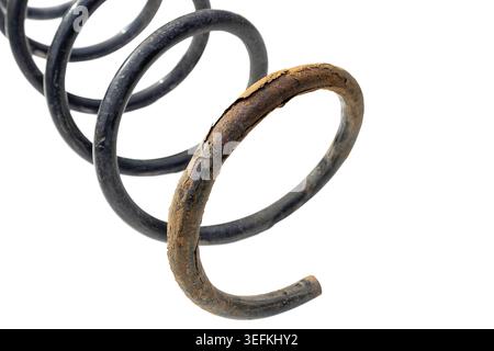 rusty and old car spring detail isolated on white background Stock Photo
