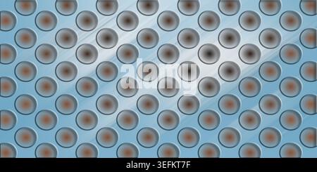 A repeating pattern of circular metallic indentations on a blue-toned background with diagonal light rays creating a soft glow effect. Stock Photo