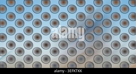 A digital abstract background showcasing a grid of circular indentations with a blue-tinted metallic finish and subtle light reflections. Stock Photo