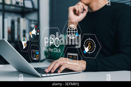 PPC advertising strategy and pay per click marketing concept. Marketer using laptop with virtual ad icon, audience targeting, campaign analytics, Stock Photo