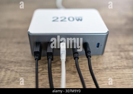 Multi charger of 220 w with several usb outputs of different types. Stock Photo