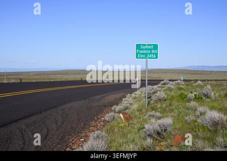 Sign on Oregon highway 74 in Morrow County for summit of Franklin Hill eleveation 3456 Stock Photo