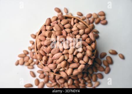 Peanuts in Bowl Top View with Defocus Backgrounds Macro Photography Stock Photo