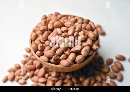 Peanuts in Bowl Angled Top View with Defocus Backgrounds Macro Photography Stock Photo