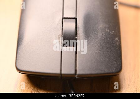 Black Computer Mouse, Front View Close-Up Macro Photograph with Soft Defocused Backgrounds and Minimal Tech Composition Stock Photo