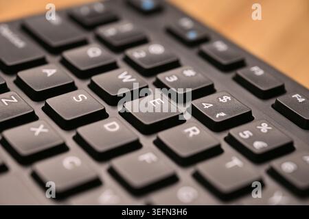 Minimal Cinematic Keyboard Macro Shot Featuring E Key in Side Angled Top View with Soft Focuss Stock Photo