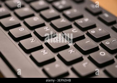 Minimal Cinematic Keyboard Macro Shot Featuring J Key in Side Angled Top View with Soft Focuss Stock Photo