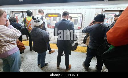Toronto, ON, Canada - April 30, 2026: Passengers waiting on a crowded platform while the train is out of service, creating delays and inconvenience. Stock Photo