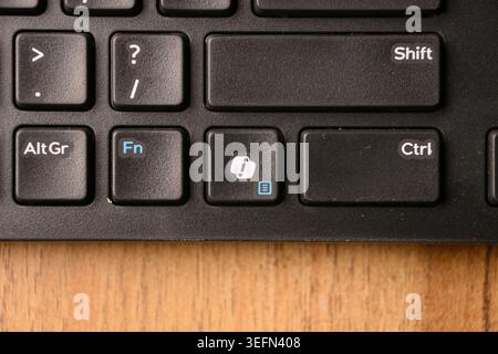 Black Computer Keyboard Macro Shot Highlighting Menu Key with Blurred Backgrounds Top View Stock Photo