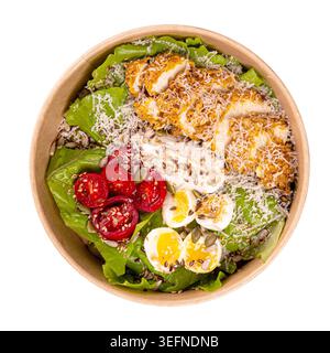 Chicken salad with egg tomatoes and cheese in bowl Stock Photo