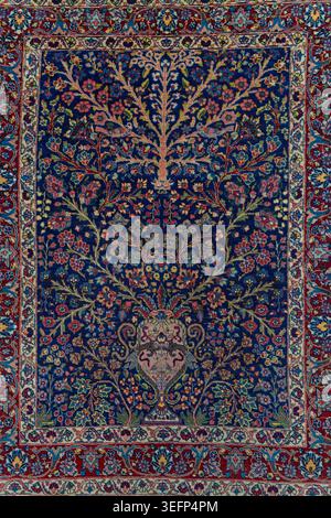 Authentic traditional Agajli carpet from the Tabriz group of East Azerbaijan Province in Iran featuring detailed ornamental patterns, rich woven textu Stock Photo