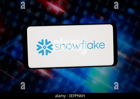 In this photo illustration, the logo of US analytics platform company Snowflake Inc. is displayed on a smartphone in front of abstract background on computer screen. (Photo by Timon Schneider / SOPA Images/Sipa USA) *** Strictly for editorial news purposes only *** Stock Photo
