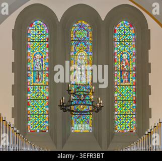 three stained glass panels in an east hampton church Stock Photo