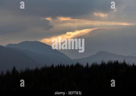 Dramatic and moody sunset over the Highlands near Loch Tulla in Scotland Stock Photo