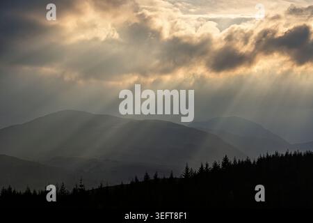 Dramatic and moody sunset over the Highlands near Loch Tulla in Scotland Stock Photo