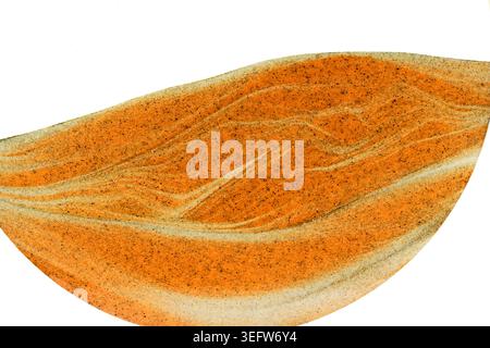 Abstract layered sand art with smooth orange waves, black grains, and subtle glitter details Stock Photo