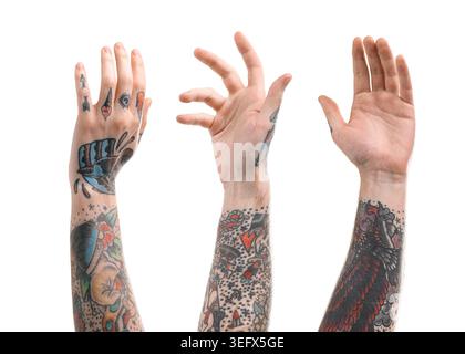 Man showing his tattooed hands on white background, set Stock Photo