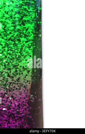Vertical green and purple glitter panel with copy space on a white background Stock Photo