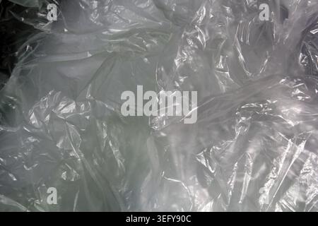 Full frame background texture of crumpled clear plastic bags Stock Photo