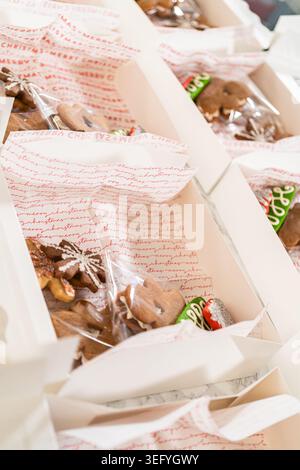 Open Holiday Cookie Gift Boxes with Festive Assorted Treats Stock Photo